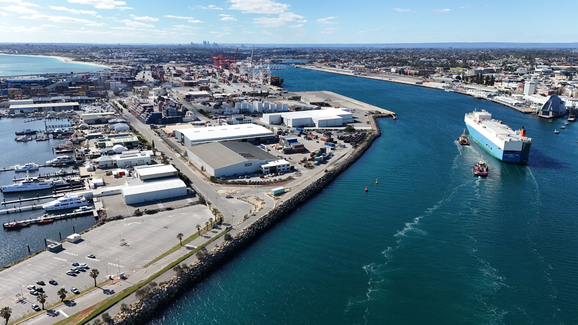 Aerial view of Fremantle harbour, with the Perth skyline in the background